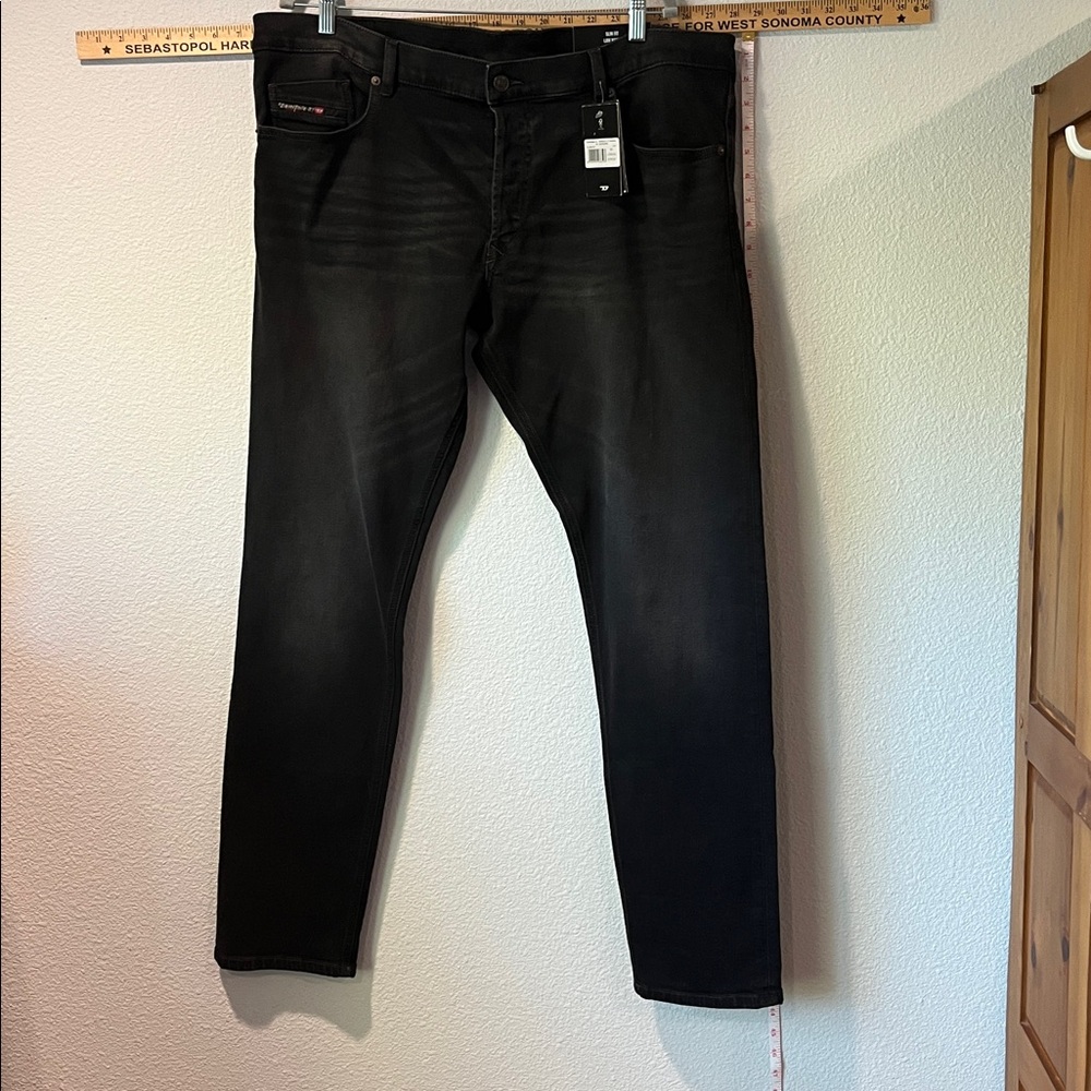 Diesel black denim button fly men’s jeans. Waist 40 length 32 NWT.